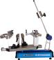 Preview: Gamma X-6 FC Pro tabletop stringing machine in full view with drop-weight arm, 6-point mounting system and fixed clamps