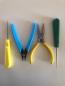 Preview: Four-piece stringing tool set with awls, pliers and side cutters