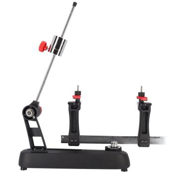 Preview: Right side view of the Gamma Momentum 2 stringing machine with 2-point mounting and drop-weight tensioning system