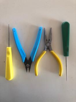 Preview: Stringing tool set consisting of two awls, needle nose pliers, side cutter.